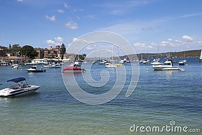 MANLY, AUSTALIA-DECEMBER 08 2013: Boats moored in Manly Cove. Ma Editorial Stock Photo