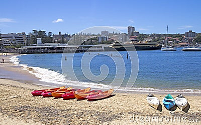 MANLY, AUSTALIA-DECEMBER 08 2013: Kayaks on Manly cove beach wit Editorial Stock Photo