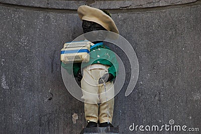 Brussels, Belgium - Closeup photo with a dressed statue of Manneken Pis seen close to the Grand Place Stock Photo