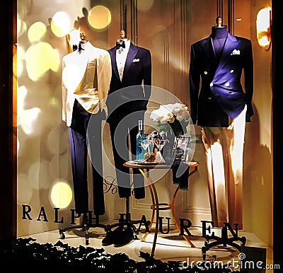 Mannequin male in beautiful business suit, standing dummy in shop window with bow tie on neck Editorial Stock Photo