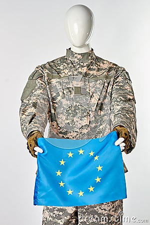 Mannequin soldier holding european flag. Stock Photo