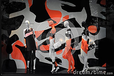 Mannequins in a modern colorful store window inspired by pop art Editorial Stock Photo
