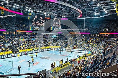 Handball match with viewers in of SAP Arena Editorial Stock Photo