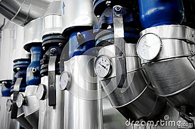 Manometers and heating pipelines Stock Photo