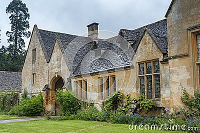 Manor House built in Jacobean period architecture 1630 in guiting yellow stone, in the Cotswold village of Stanway Gloucestershire Stock Photo