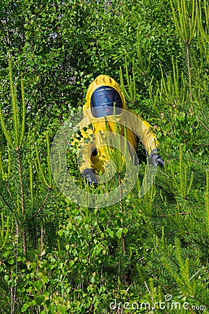 Mans with briefcase in protective hazmat suit Stock Photo