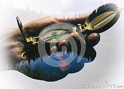 Mans hand with a compass. Stock Photo