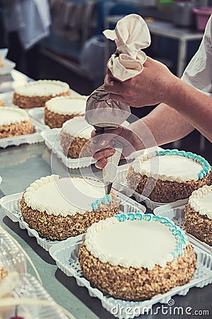 Manual cakes production Stock Photo