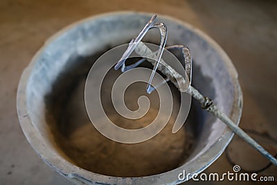 Manual fixture for mixing cement, construction Stock Photo