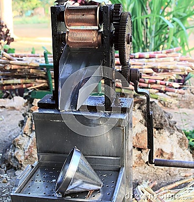 Manual mechanism for making juice from sugar cane Stock Photo