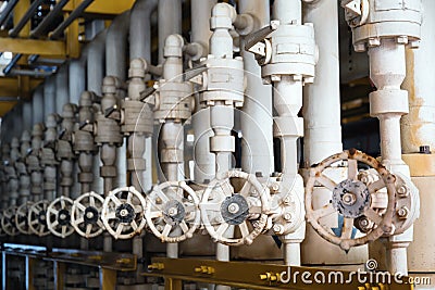 Manual operate ball valve at offshore oil and gas central processing platform, manual valve Stock Photo