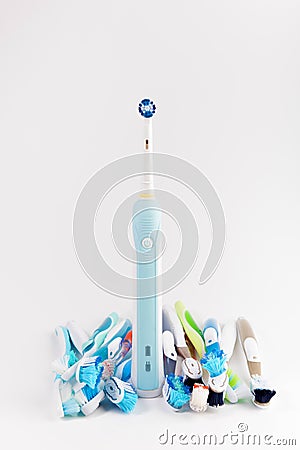 Manual regular Toothbrush Against Modern Electric Toothbrush Stock Photo