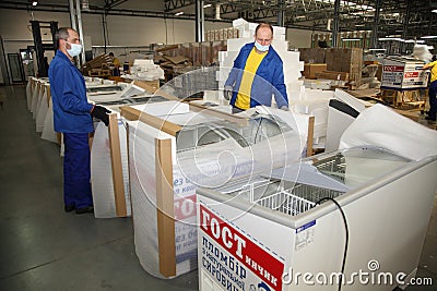 Manufacture of freezers for retail. Refrigeration equipment manufacturing. Editorial Stock Photo