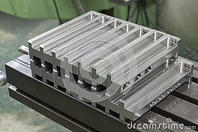 Manufacture stainless steel array on steel table Stock Photo