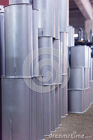Manufactured silver metallic tubes Stock Photo