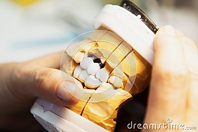 Manufacturing of dental implants. Formation of a bite on a plaster model of a human jaw Stock Photo