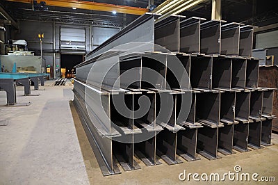Manufacturing of a welded I-beam on an automatic welding line. Products of the plant for the production of metal structures Stock Photo