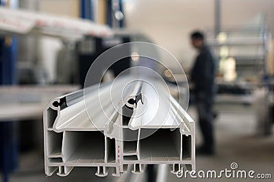 Manufacturing of the window profile. Stock Photo
