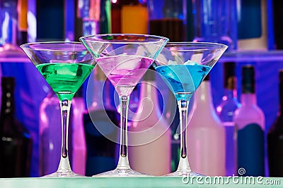 Many alcohol drinks with ice in the bar Stock Photo