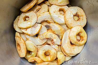 Many apple slices in metal pan Stock Photo