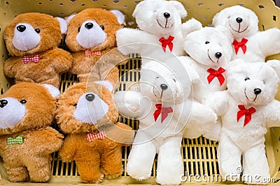 Many Bear Dolls in the Plastic Basket Stock Photo