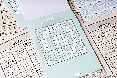 Many blank sudoku crosswords. Popular logic game with numbers Stock Photo