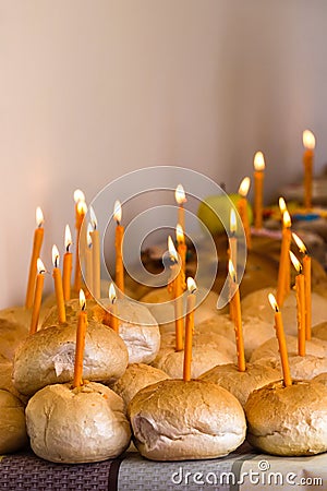 Many breads with lighted candles Stock Photo