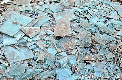 Many broken glass pieces on the ground Stock Photo