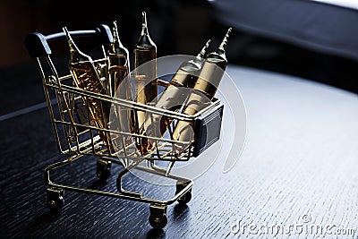 Many brown ampoules set in cart Stock Photo