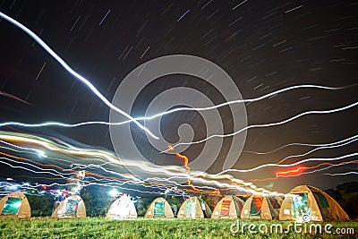 Many camping tents and lights at the african night Stock Photo