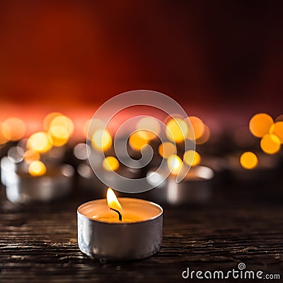 Many candles symolizing funeral religios christmas spa celebration birthday spirituality peace memorial or holiday burning Stock Photo