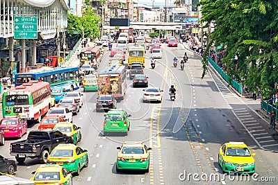 Many cars, bus and motorcycles cause traffic jams at Rajdamri Road. Sky Walk at Central world Editorial Stock Photo