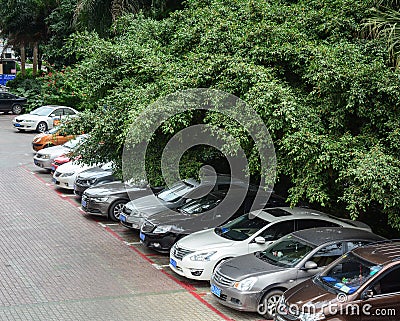 Many cars parking at the park in Nanning, China Editorial Stock Photo