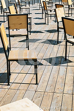 Many chairs made of plywood in the open area Stock Photo
