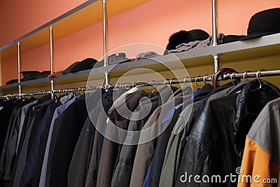 Many clothes in cloakroom Stock Photo