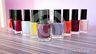 Many colored bottles of nail polish Stock Photo