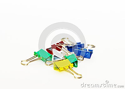 Many colored metal clips on a light background. Stock Photo