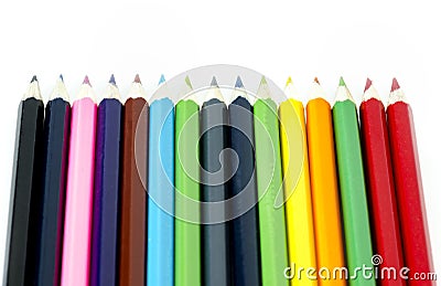 Many colored pencils aligned on white background Stock Photo