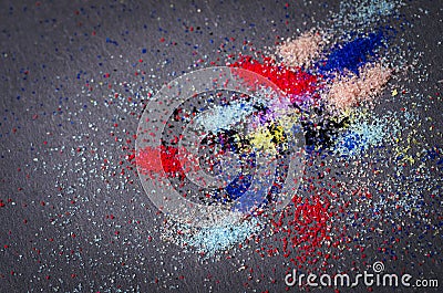 Many colored powder paint makeup artistry abstract scattered on Stock Photo