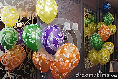 Many colorful balloons with butterflies, decoration in restauran Stock Photo