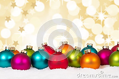 Many colorful Christmas balls background decoration stars snow w Stock Photo