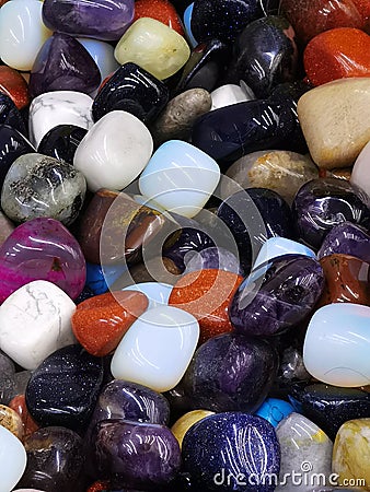Many colorful mineral stones close up. Geology, souvenirs wallpaper Stock Photo