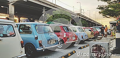 Many colorful mini Austin classic or cooper parked on street for group meeting Editorial Stock Photo