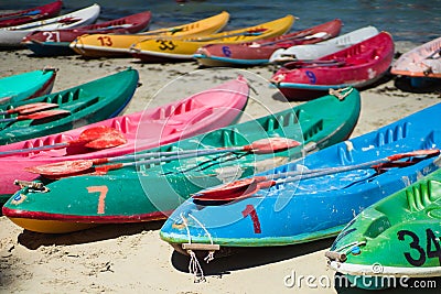 Many colorful old Canoes Kayaks on the beach at Nang Rum Beach, Sattahip, Chonburi, Thailand Editorial Stock Photo