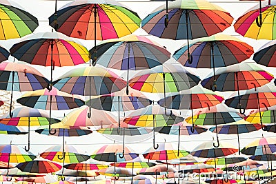 Many colorful umbrellas. Stock Photo