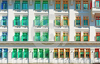 Many-coloured windows in old vintage classical building Stock Photo