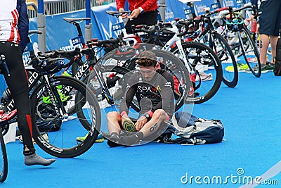 Many competitors preparing before triathlon race Editorial Stock Photo