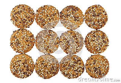 Many cookies with sesame seeds isolated on white Stock Photo