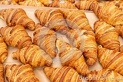 Many Croissant at Street Market, Fresh Puff Pastry Pies, Sweet Kipferls, Buttery Chocolate-Nutty Viennoiseries Stock Photo