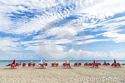 Many deck chairs in South beach Stock Photo